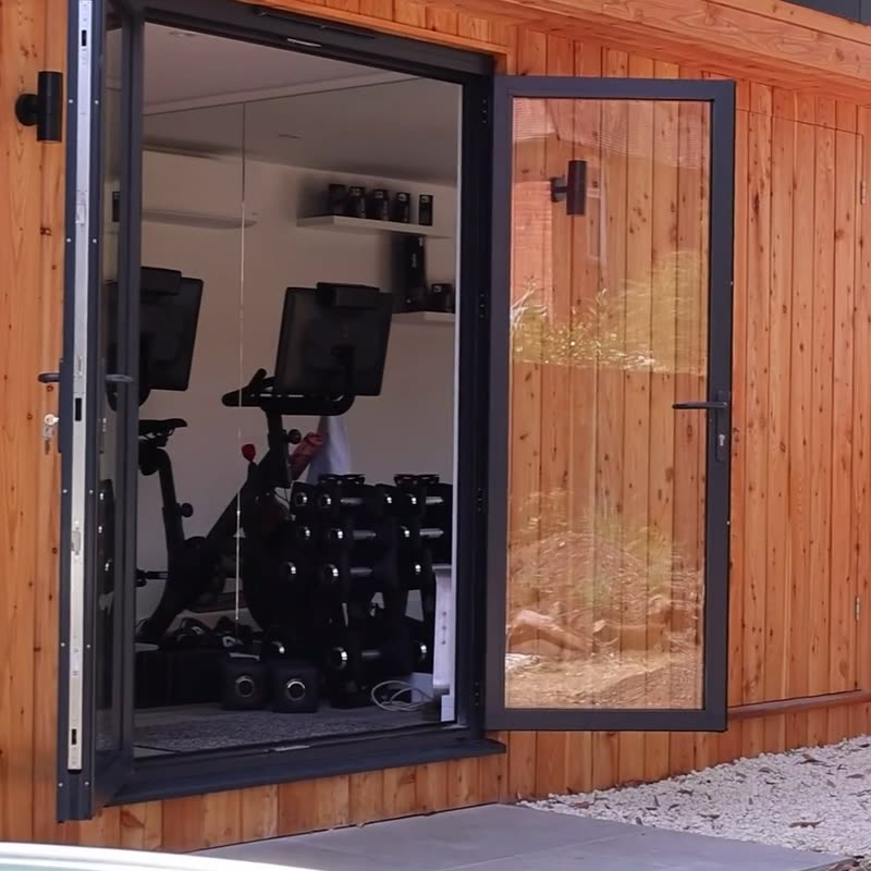 Tour of a timber clad garden room with home gym